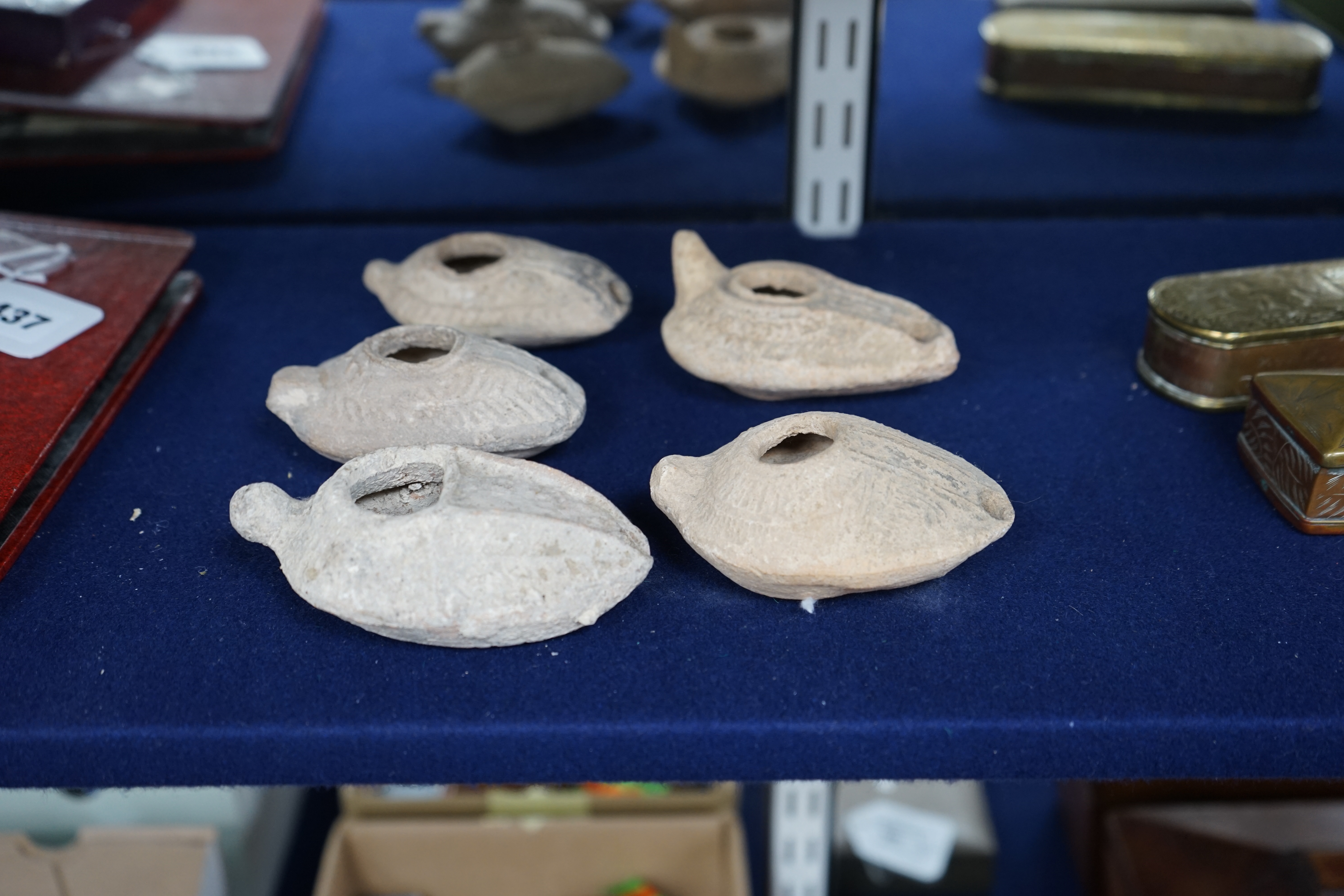 Five Roman terracotta oil lamps, 3rd century. Condition - poor to fair